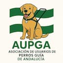 Logo AUPGA, dibujo de un perro guía con la bandera de andalucia detrás